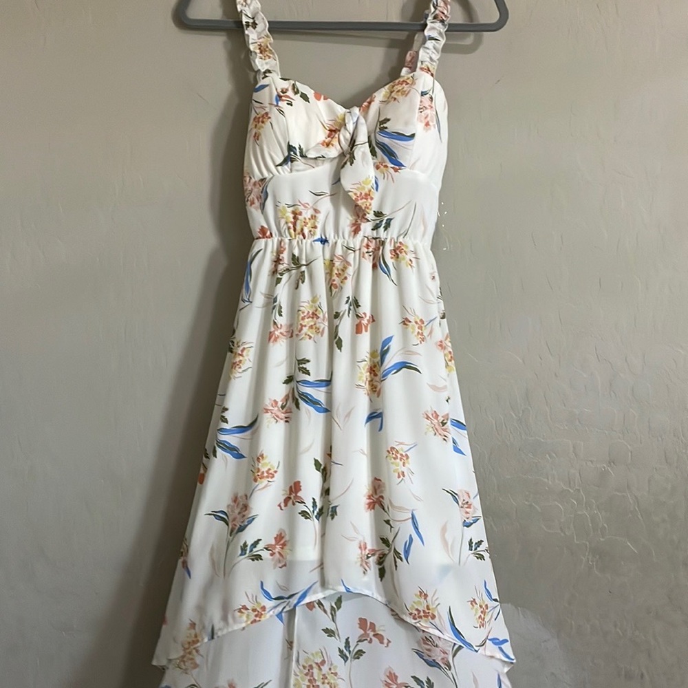 Women’s dress, white with blue and orange etc, the brand is lily rose.